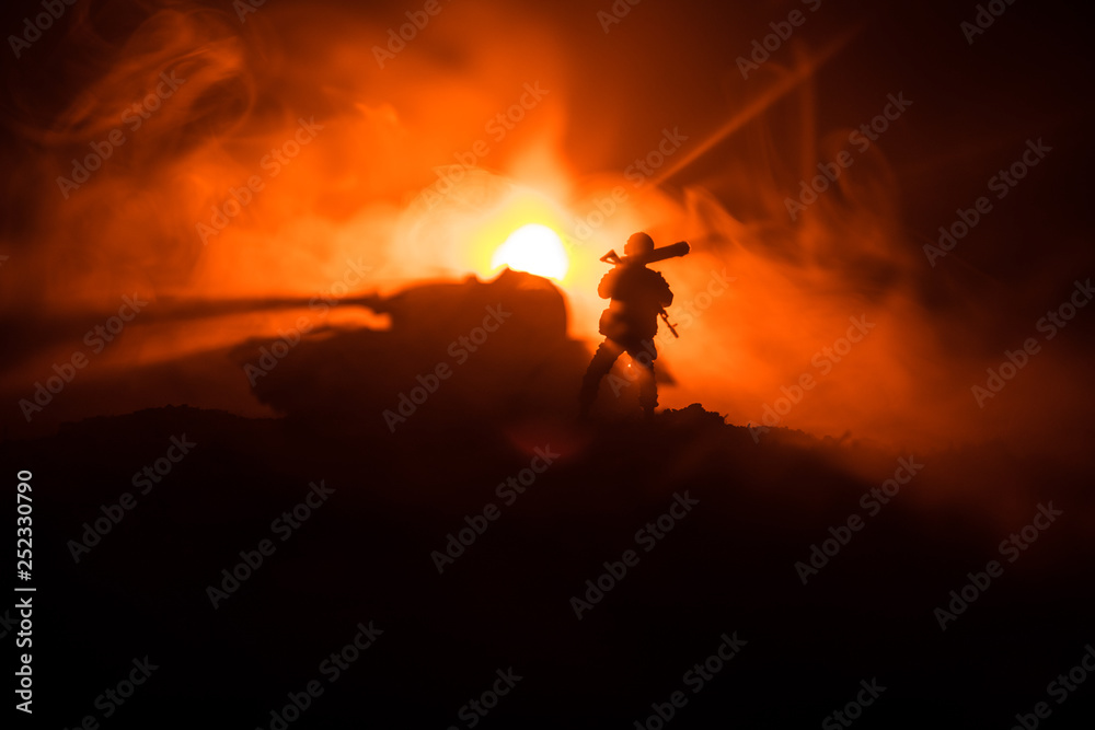 Fototapeta premium Military soldier silhouette with bazooka. War Concept. Military silhouettes fighting scene on war fog sky background, Soldier Silhouette aiming to the target at night