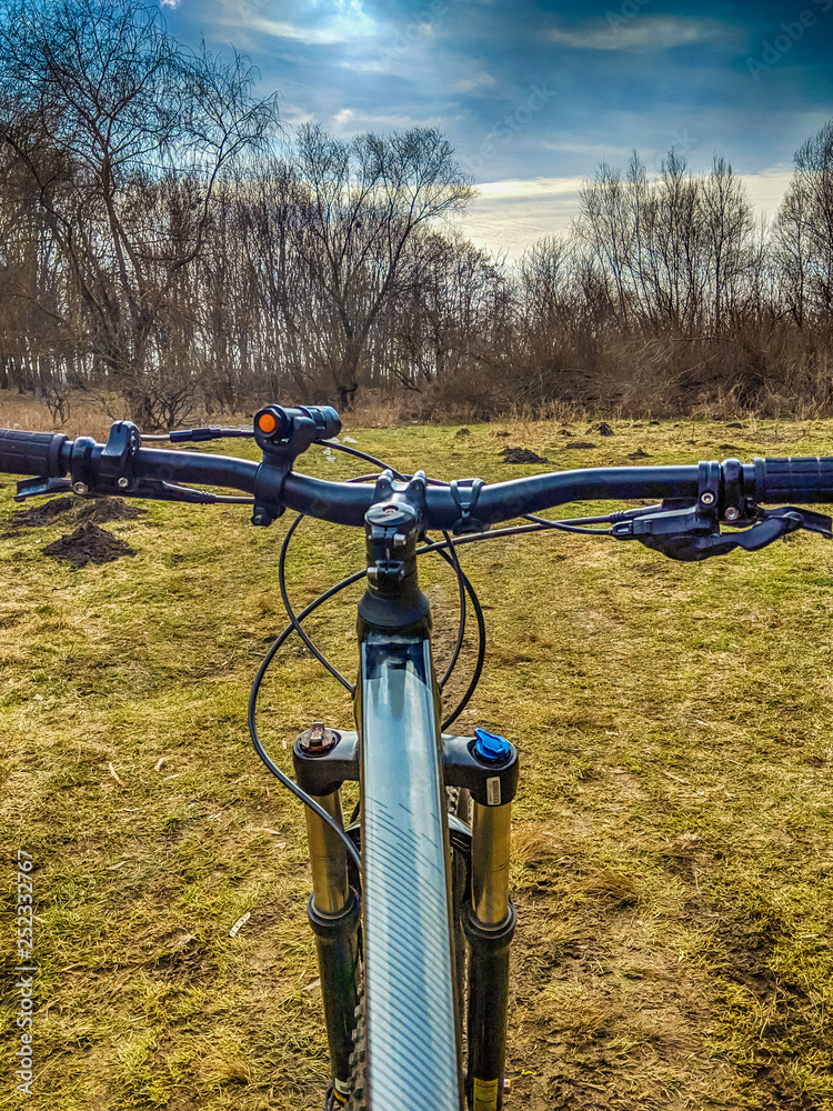 MTB bicycle on the trail in the spring season MTB bicycle on the trail in the spring season