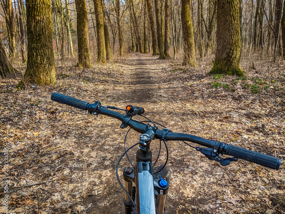 MTB bicycle on the trail in the spring season MTB bicycle on the trail in the spring season