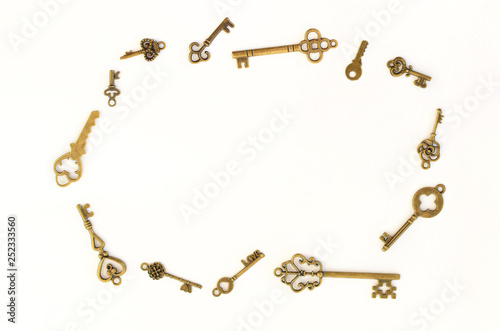 Decorative keys of different sizes, stylized antique on a white background. Arranged in a circle