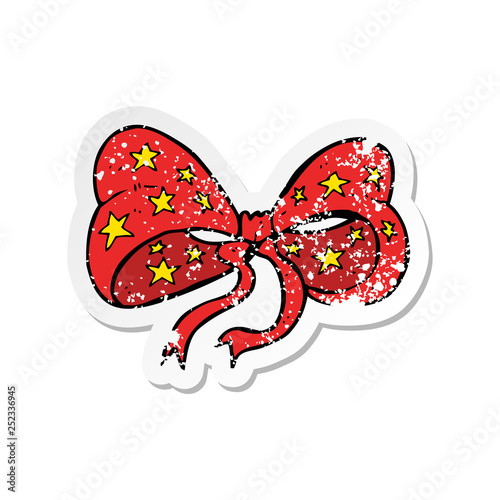 retro distressed sticker of a cartoon bow tie