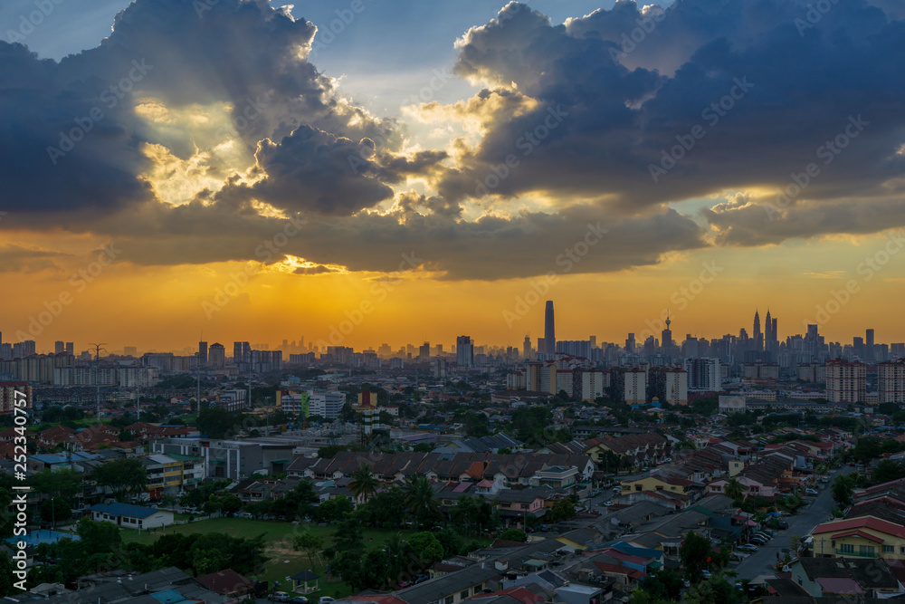 Silhouette shot of downtown Kuala Lumpur skyline at twilight in Malaysia