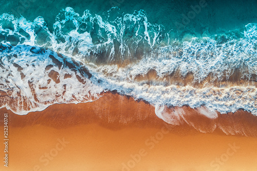 Fotografie, Obraz Aerial view of sea waves and sandy beach