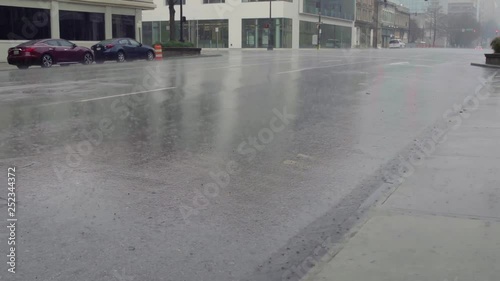 Wallpaper Mural Rain falls on the streets of downtown Birmingham during a winter storm Torontodigital.ca