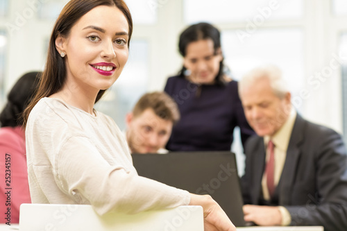 Beautiful businesswoman during the business meeting in a boardroom