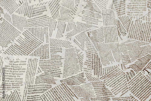 Black and white repeating torn newspaper background. Continuous pattern left, right, up and down