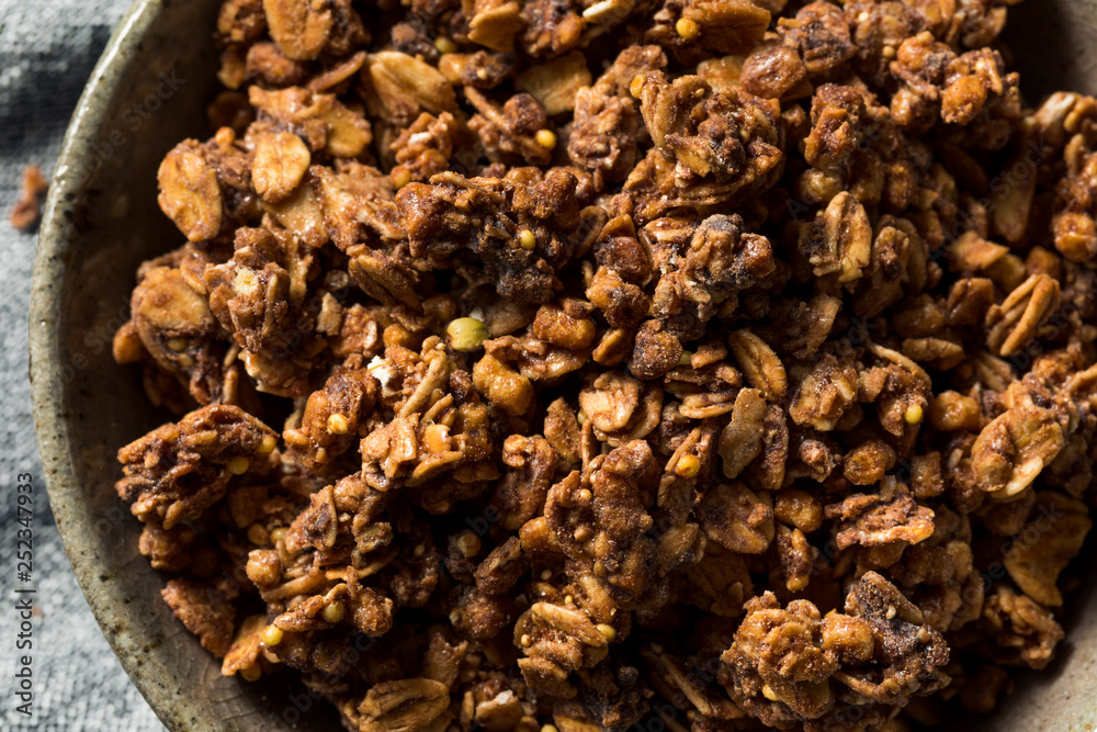 Obraz premium Homemade Chocolate Granola in a Bowl
