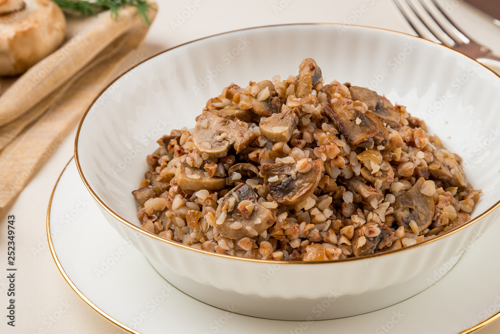 Fried buckwheat porridge with onions and mushrooms