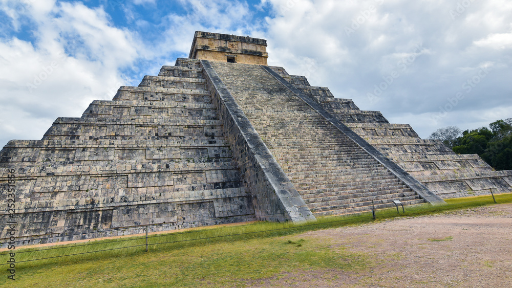 Temple of Kukulkan - a Mesoamerican step-pyramid that is the main tourist attraction at the Chichen Itza archaeological site in Yucatan, Mexico.