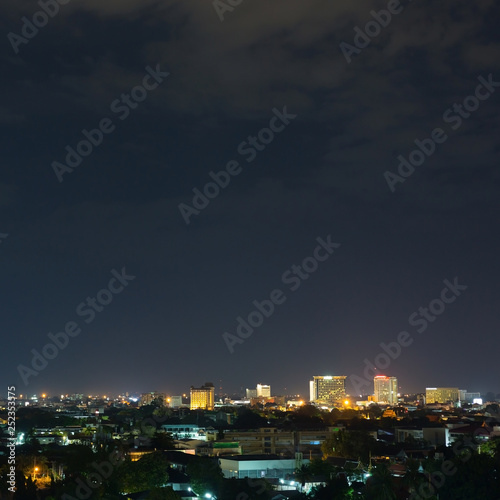 landscape city night with dramatic moody dark sky