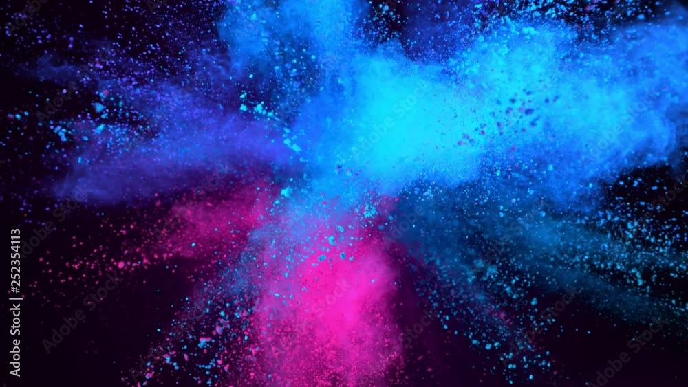 Super slowmotion shot of color powder explosion isolated on violet background. Shot with high speed cinema camera at 1000fps