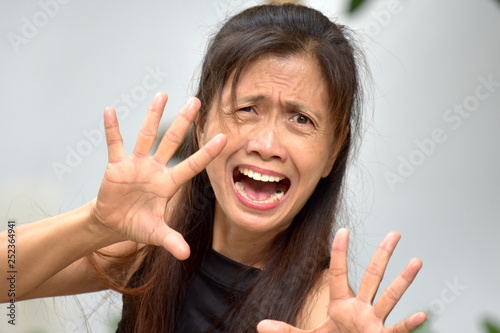 Asian Female Senior Afraid