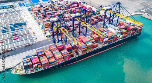 Cargo ship, loading and unloading goods at the deep sea port