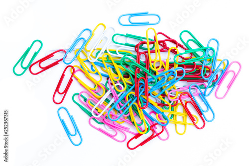 Colorful paperclips isolated on white background.