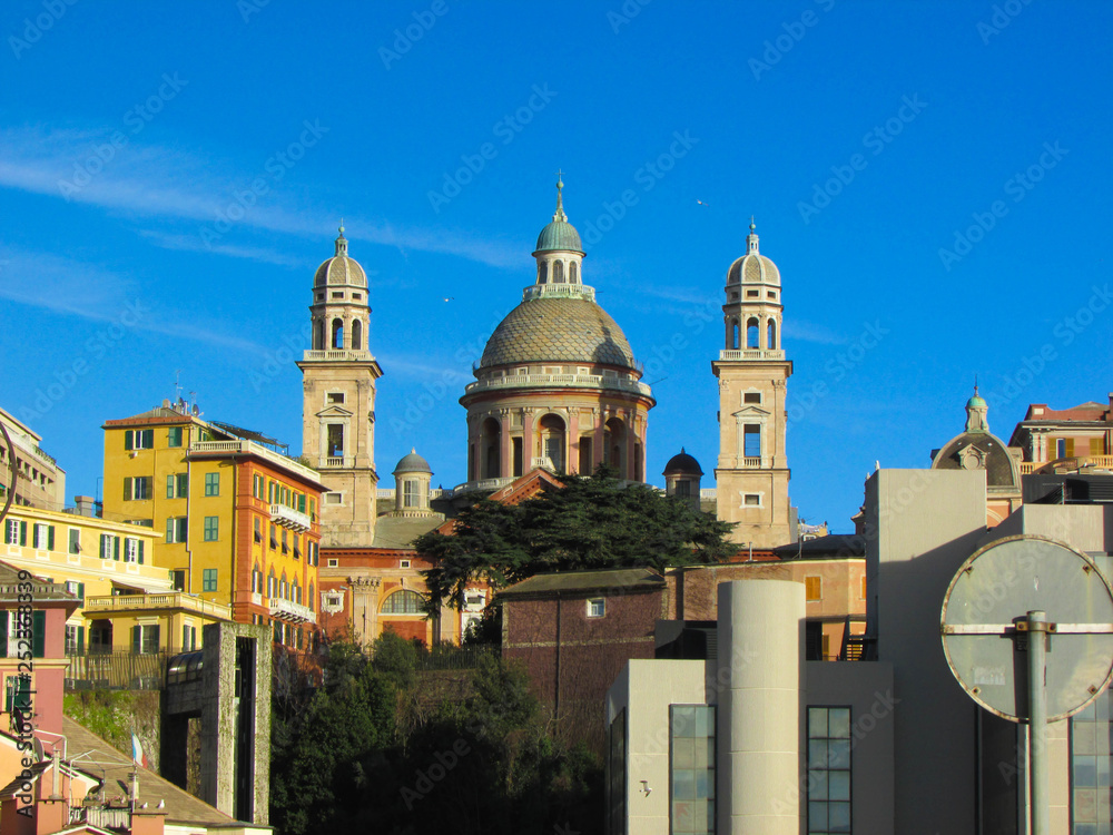Renaissance church Santa Maria Assunta surrounded by city Genoa, Italy