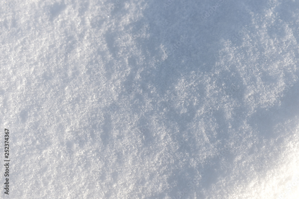 The texture of the snow close up. WInter background The texture of the snow close up. WInter background