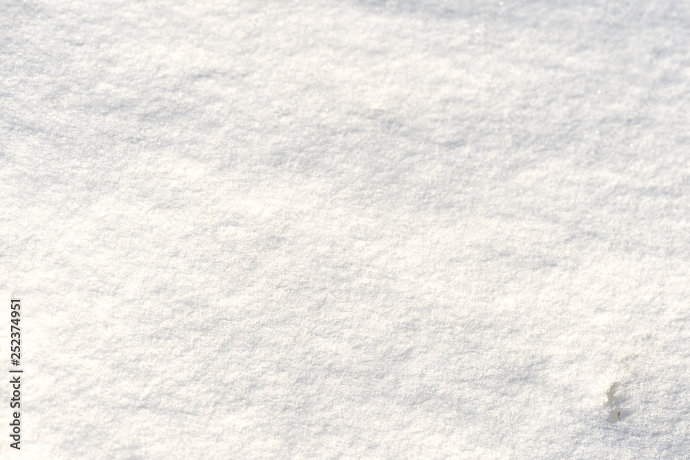 The texture of the snow close up. WInter background