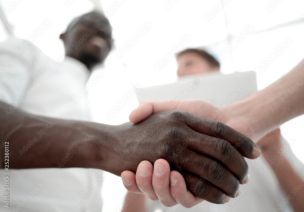 Fototapeta premium close up.business handshake over blurry background