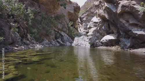 Mountain lake. The beautiful mountain scenery. Wadi Bani Khalid. Oman. photo