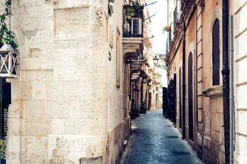 Ancient street with old houses on Ortygia Island  Syracuse  Siracusa   Sicily.