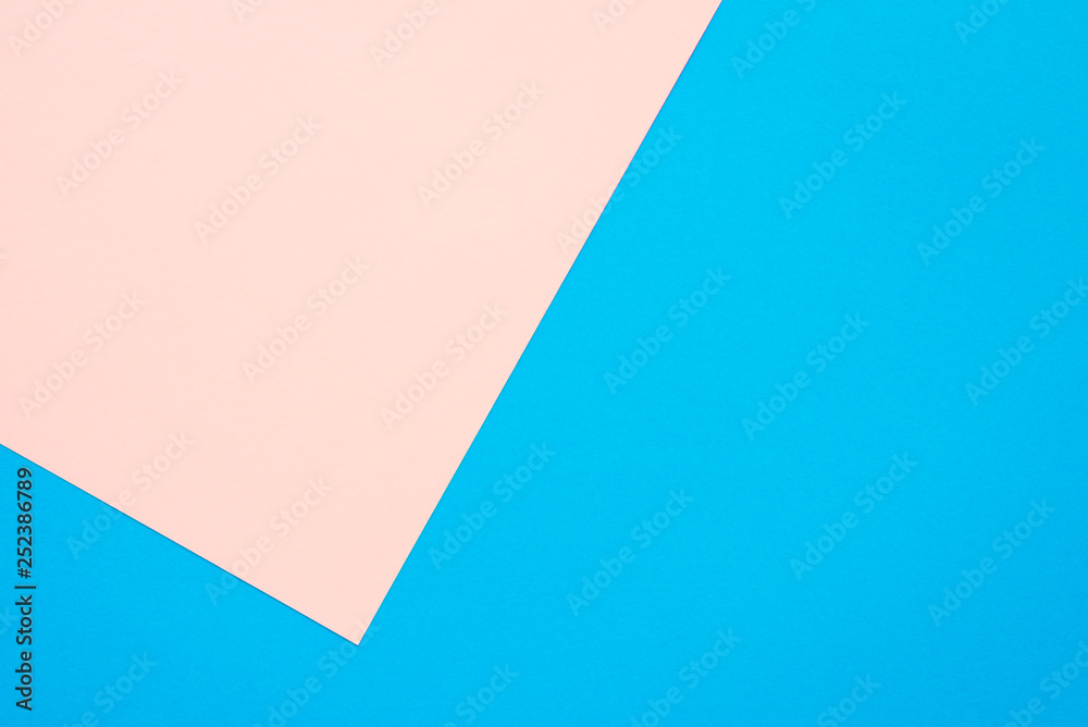 Fototapeta premium Two tone pink blue color paper background with copy space