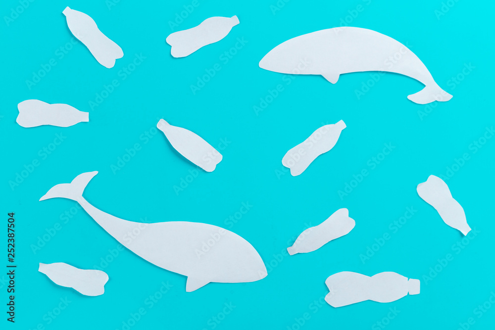 a whale of garbage plastic floating in the ocean