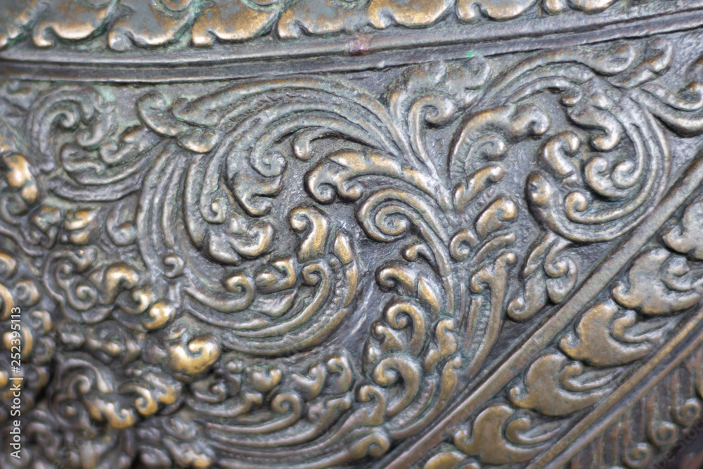 Texture Lion cast by bronze in Wat Phra Kaew or name officially as Wat Phra Si Rattana Satsadaram