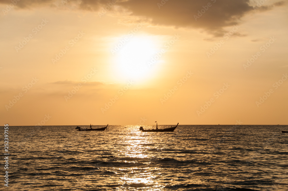 Fototapeta premium Sunset on the Naithon beach on Phuket in Thailand