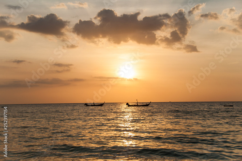 Sunset on the Naithon beach on Phuket in Thailand © Юлия Серова
