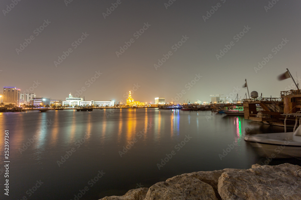 Night shot in Doha port capturing the Fanar mosque.
