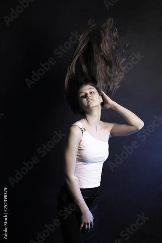 portrait of beautiful young woman with long hair .