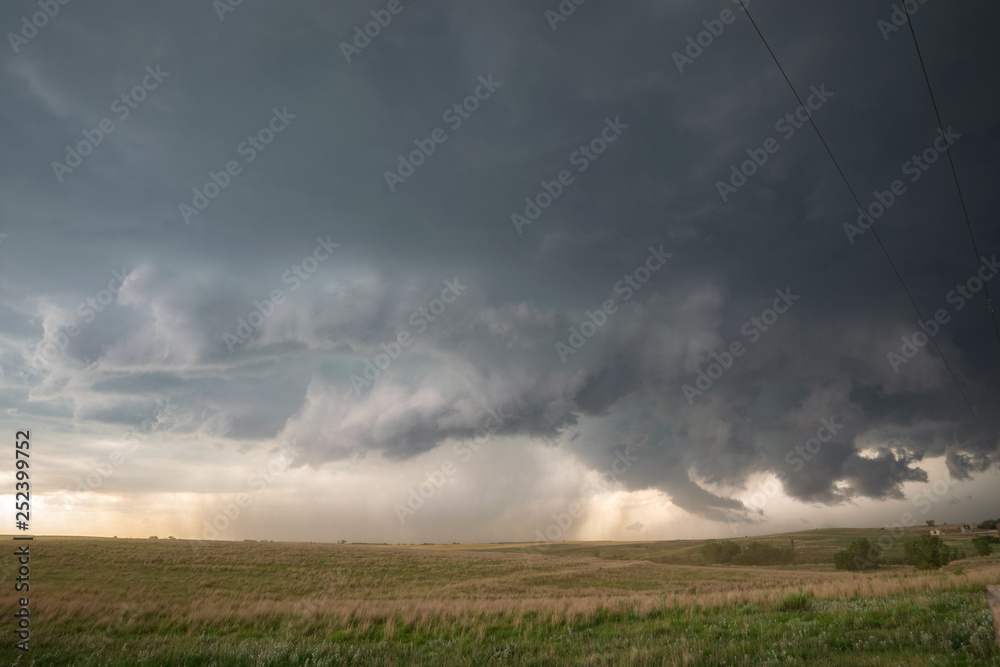 Rotating clouds of a supercell thunderstorm over the plains of northwestern Oklahoma. Dramatic sky of a severe thunderstorm on the high plains. This storm produced very large hail and even a tornado. Rotating clouds of a supercell thunderstorm over the plains of northwestern Oklahoma. Dramatic sky of a severe thunderstorm on the high plains. This storm produced very large hail and even a tornado.