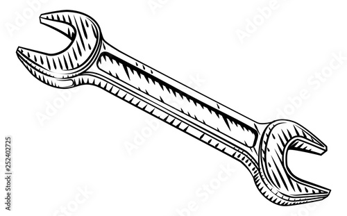 Plumbers or mechanics spanner or wrench in a vintage intaglio woodcut engraved or retro propaganda style