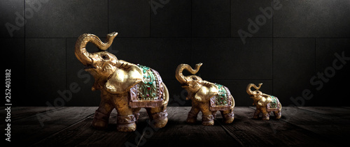Golden elephant on a wooden...