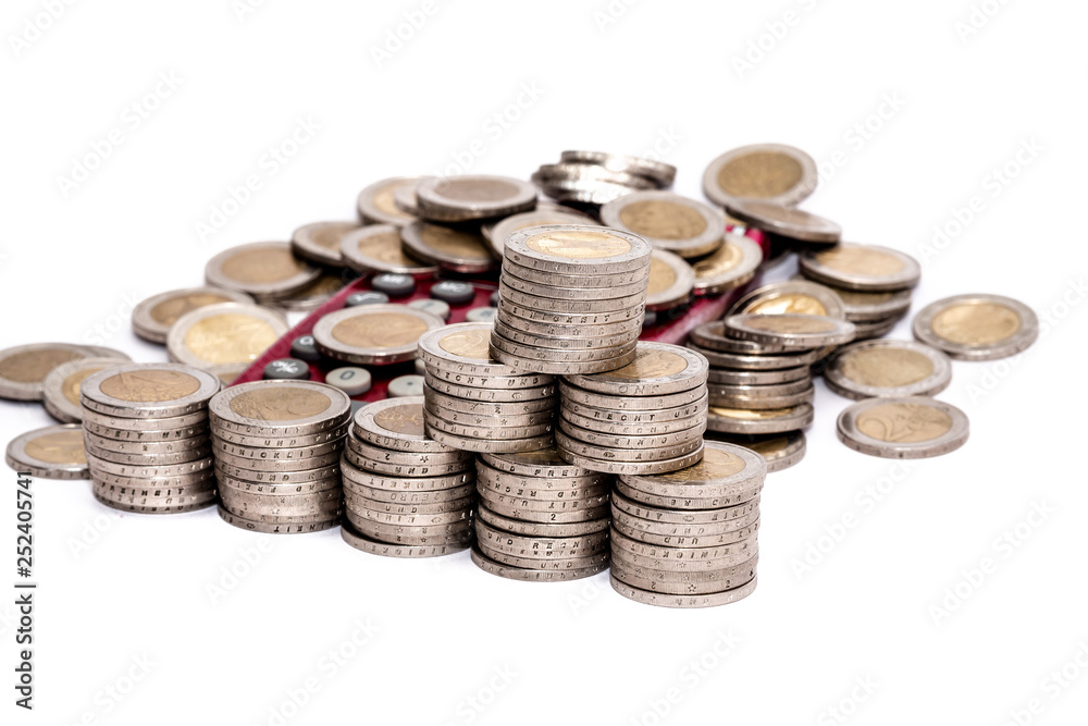 Euro coin pile with pocket calculator Euro coin pile with pocket calculator