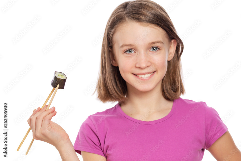 Smiling teen girl holding japanese chopsticks with roll, isolated on white background Smiling teen girl holding japanese chopsticks with roll, isolated on white background