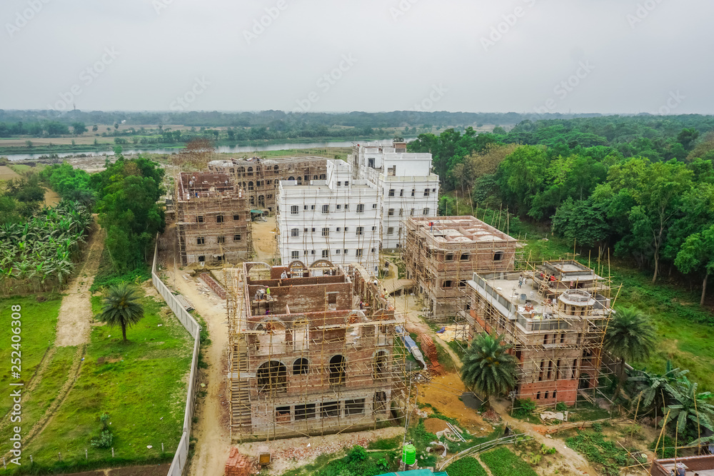 Construction of residential buildings in the village of Mayapur, India