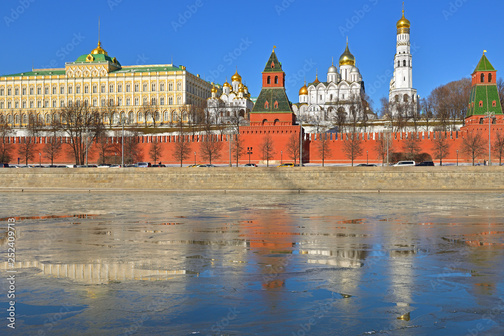 Anticipation of spring. Kremlin, Kremlin Embankment, Moscow river and reflection of ice