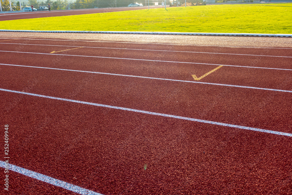 Fototapeta premium Red running track in stadium