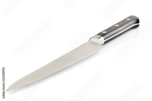 Unused kitchen knife on white surface