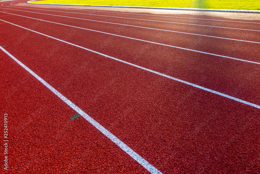 Fototapeta premium Red running track in stadium