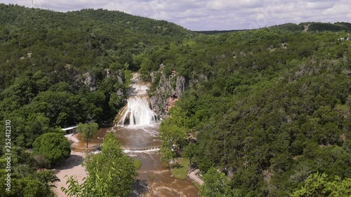 Ultrawide shot of Turner Falls overflowing after days of rain, Arbuckle Mountains, Oklahoma  photo