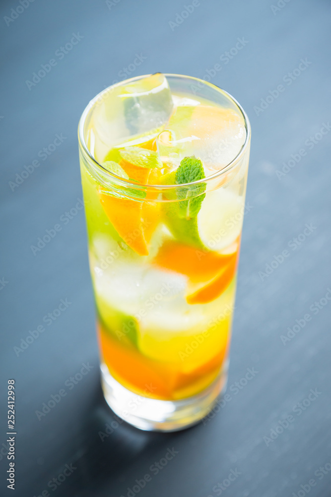 Mandarine mojito cocktail lime and mint. Selective focus. Shallow depth of field. Mandarine mojito cocktail lime and mint. Selective focus. Shallow depth of field.