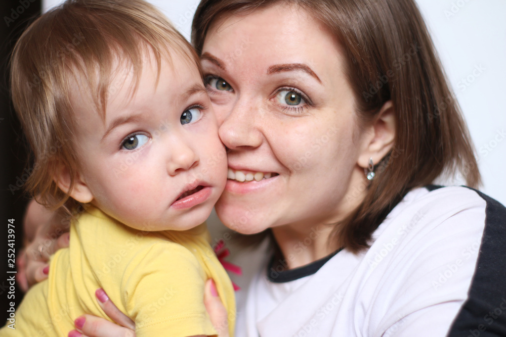 A happy mom and curious daughter A happy mom and curious daughter