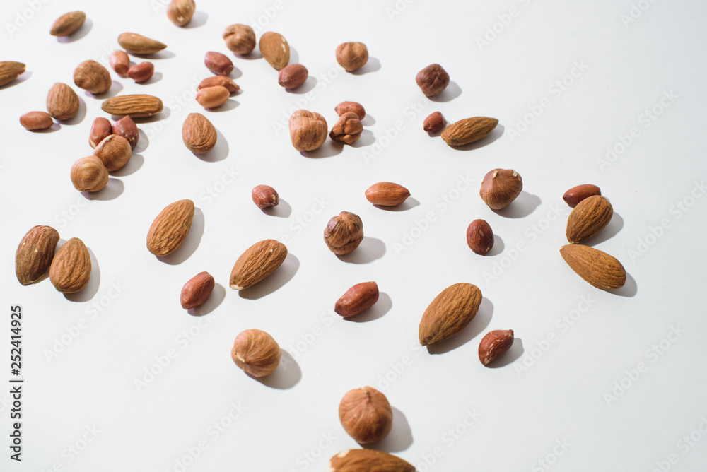 Pattern of nuts mix with copy space. Various nuts isolated on white. Pattern of nuts mix with copy space. Various nuts isolated on white.