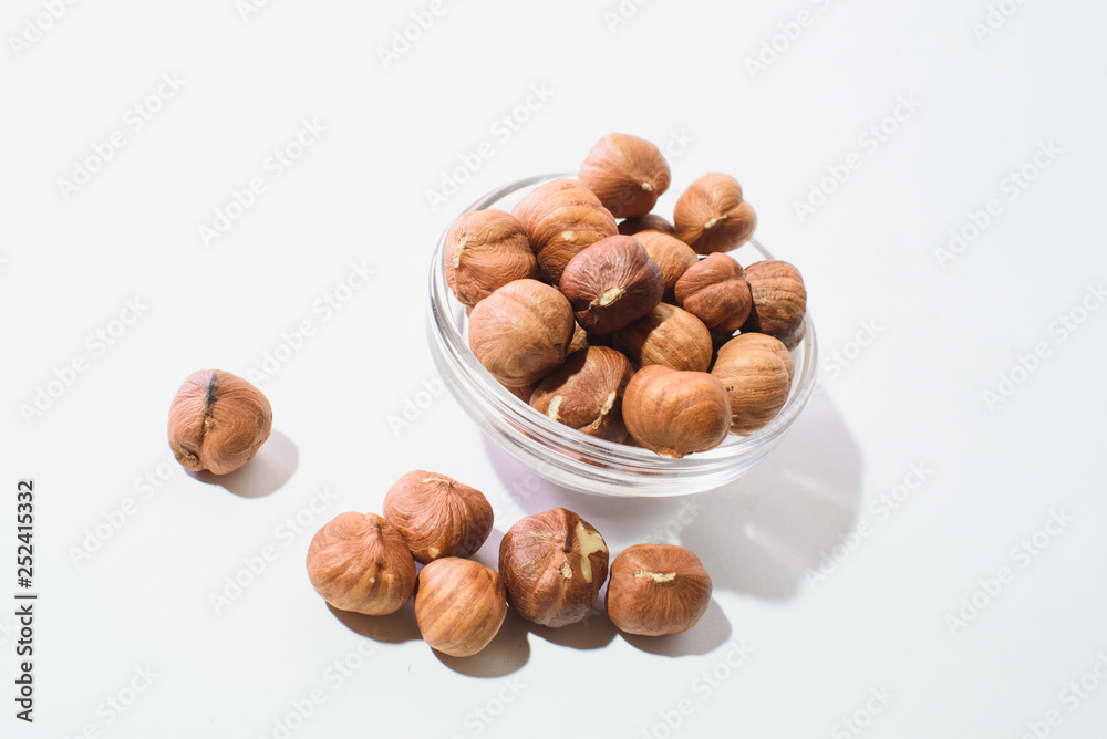 The top view of hazelnuts isolated on white background The top view of hazelnuts isolated on white background