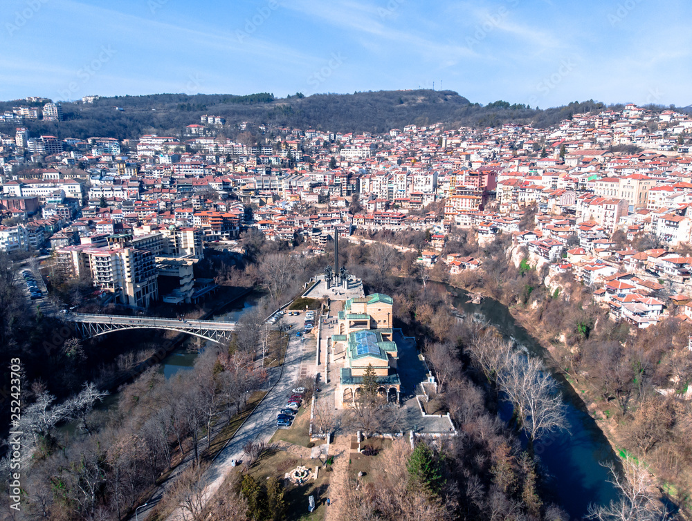 big Bridge crossing the river in Veliko Tarnovo to an Orthodox Church and old town in a Cliff