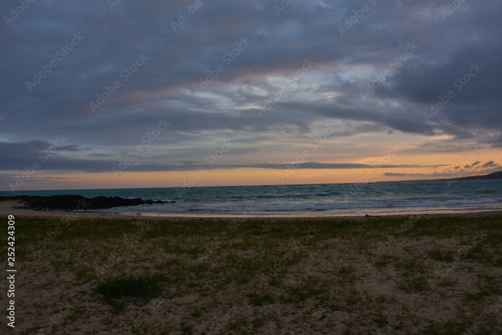 Sunset with volcano isla isabela