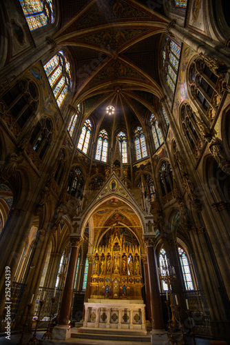 VIENNA, AUSTRIA - AUGUST 11, 2017: Interior of the Votive Church in Vienna. The church was consecrated in 1879 and is in Gothic revival style © Denis Zaporozhtsev