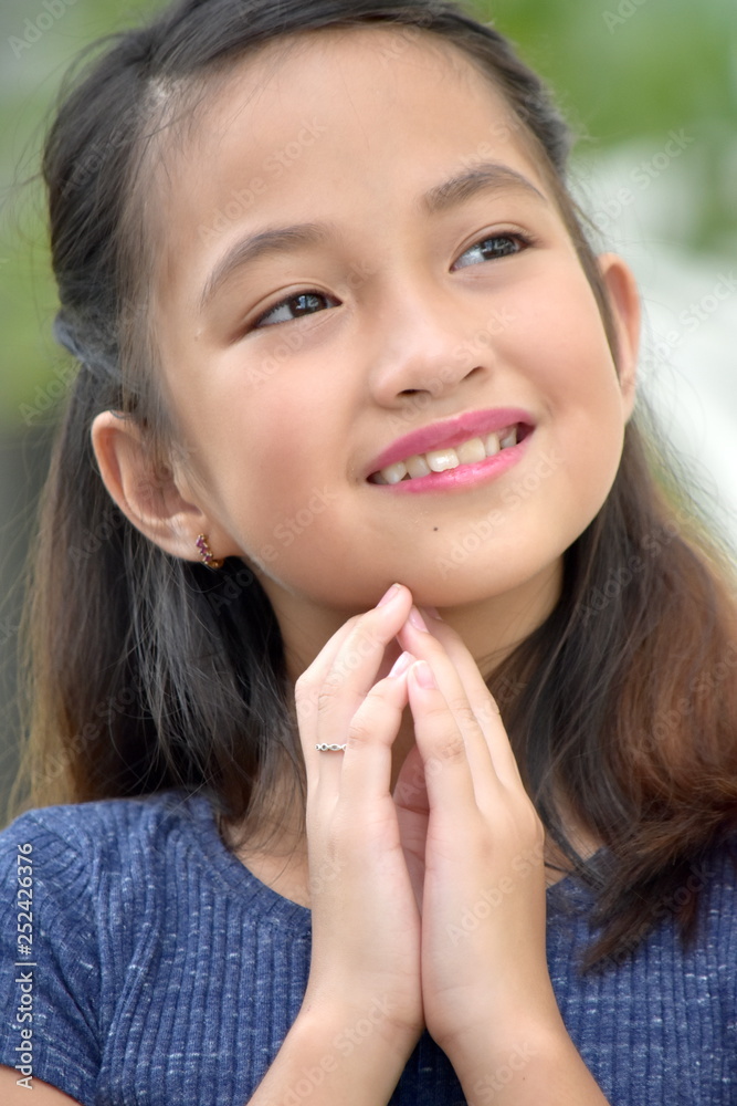 A Teen Girl Praying